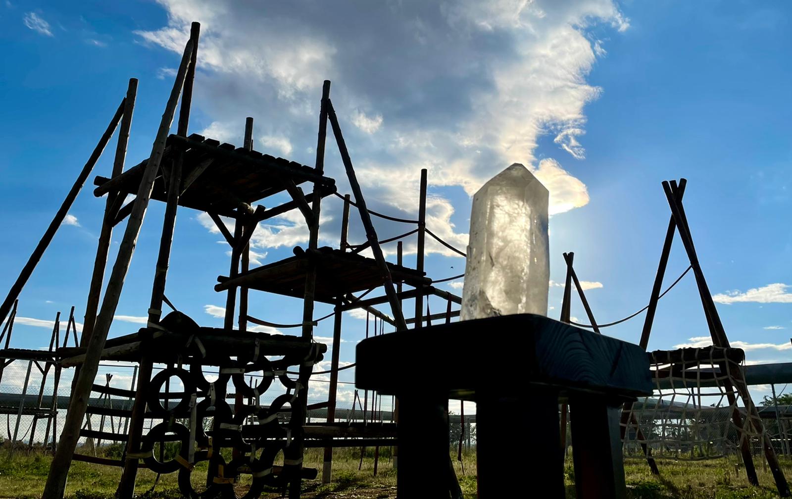 crystal "monolith" installed in the chimpanzee enclosure with their climbing equipment visible behind it